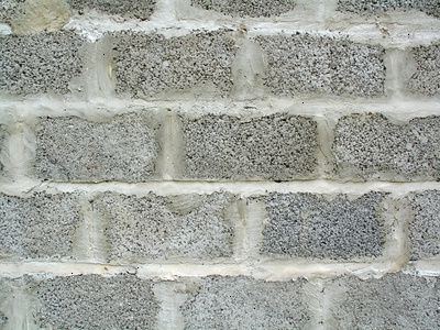 Hur man gör en krökt betongblock stödmur